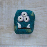 pure, felted wool soap, this is one of our felted soap bars designed as a monster, made with 100% wool they come in all different shapes and sizes