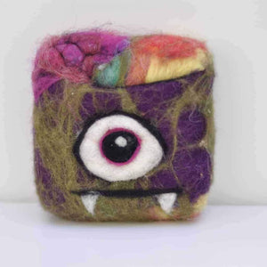 hand felting each soap individually, we design each monster shown in the photo ourselves by needle felting them by hand