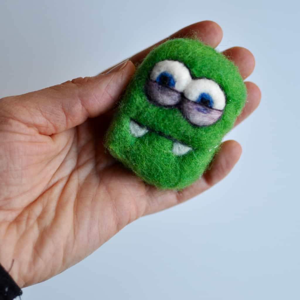 felting soap, this handmade felted bar soaps is designed as a monster and has a soap saver kind of feel