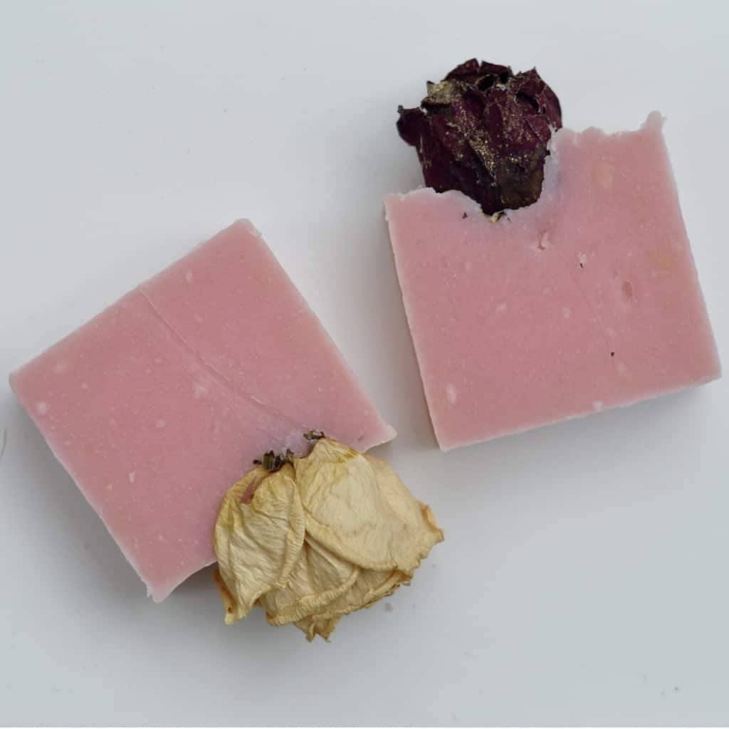 rose pedal soap that has all of its pedals intact when you receive it, on top of each bar is a red or white full rose without the stem